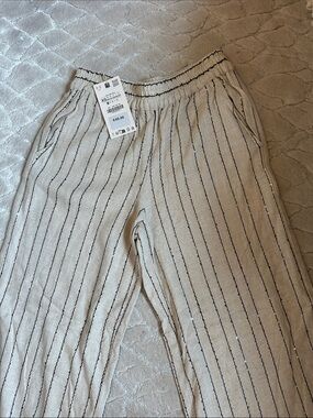 Zara lightweight beige linen pant with black stripe and sequence throughout